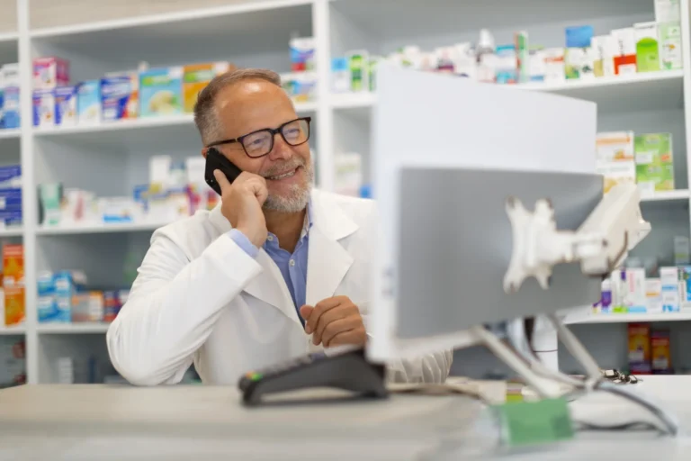 A pharmacist helping a patient